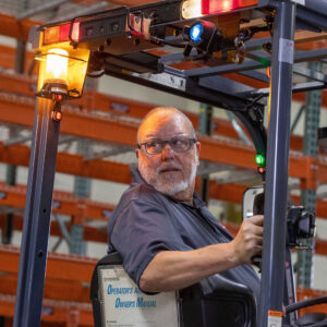 A forklift driver gets forklift safety training in Los Angeles.