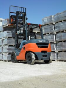 Toyota IC pneumatic tire forklift in a work yard